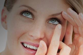 Woman Putting in Contact